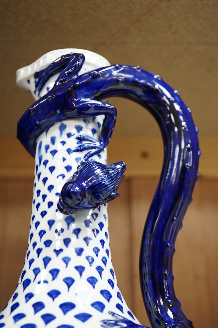 An unusual late 19th century Royal Worcester 'dragon' jug with blue scale decoration, 30cm